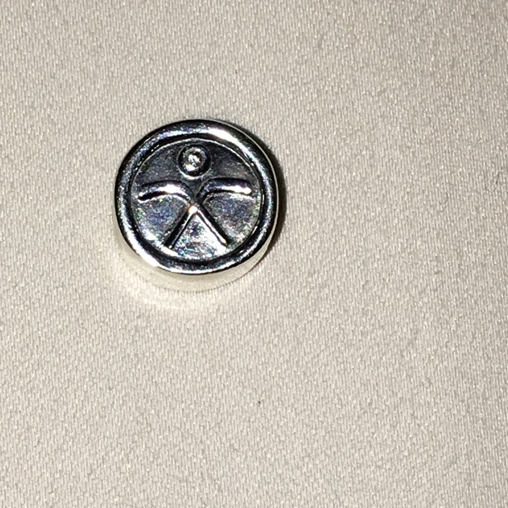 Pandora retired hockey puck charm 791203